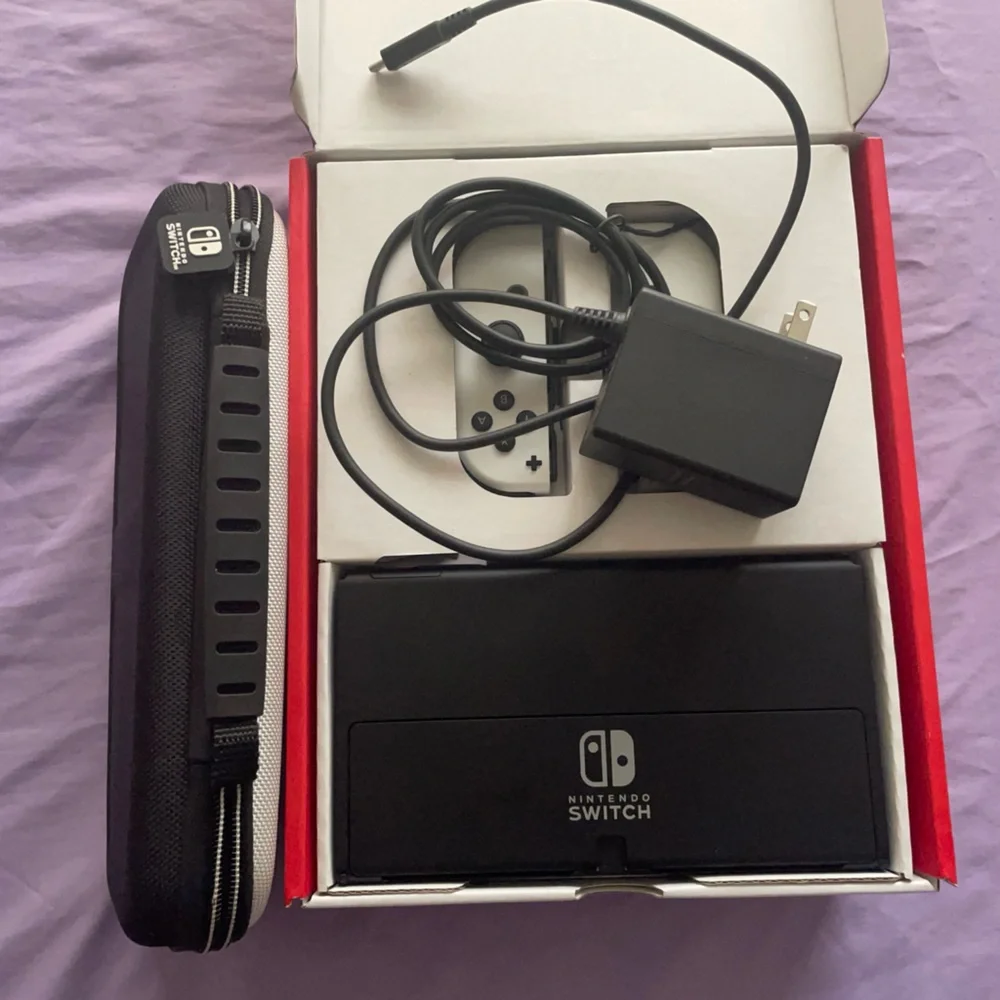 Nintendo Switch with Gray Joy-Con and Accessories
